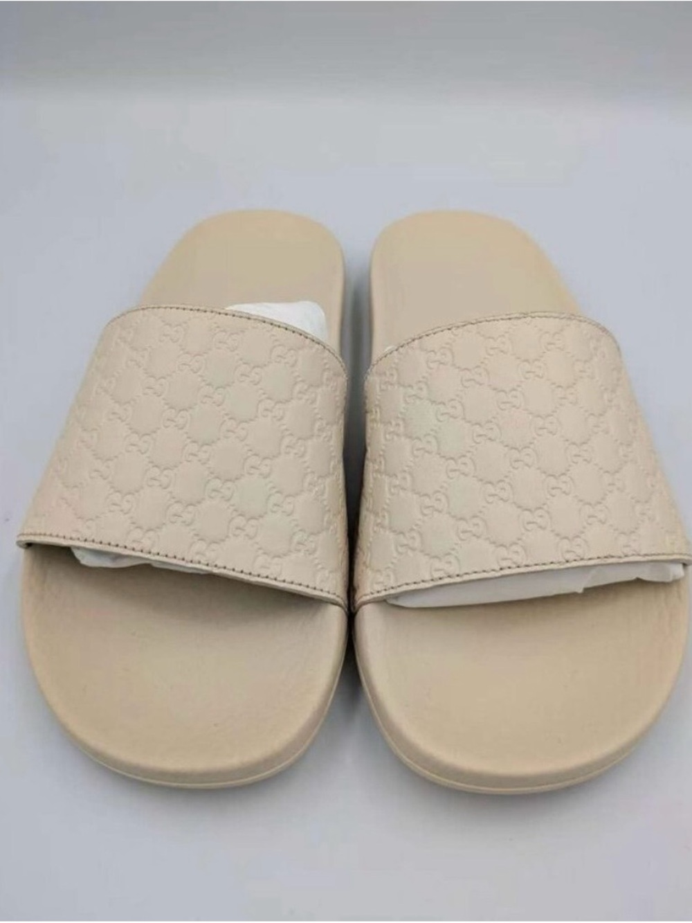 Gucci Cream Embossed Logo Slide Sandals